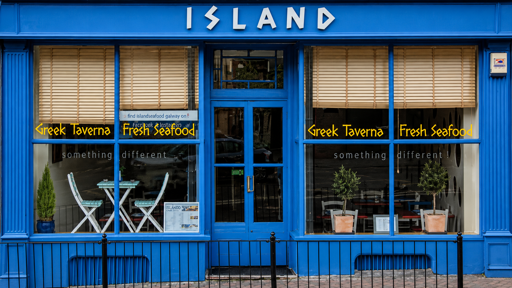 The blue Island Greek restaurant storefront in Worcester
